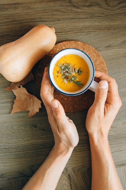 Warm up with a comforting bowl of homemade pumpkin soup, perfect for fall.